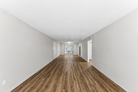 the living room and dining room are spacious and have hardwood floors